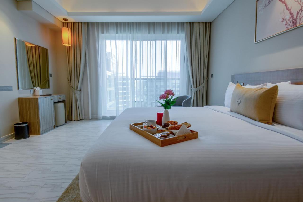 דובאי Jood Hotel Apartments מראה חיצוני תמונה
