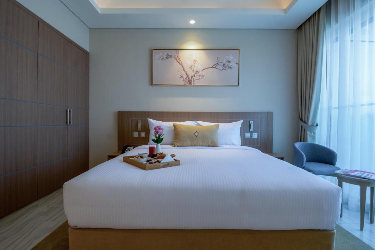 דובאי Jood Hotel Apartments מראה חיצוני תמונה