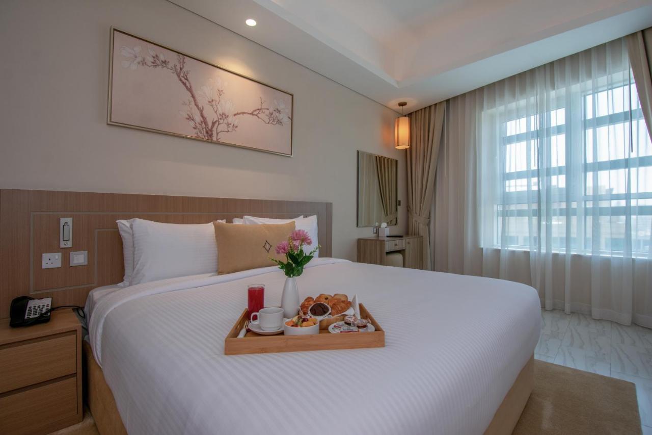 דובאי Jood Hotel Apartments מראה חיצוני תמונה