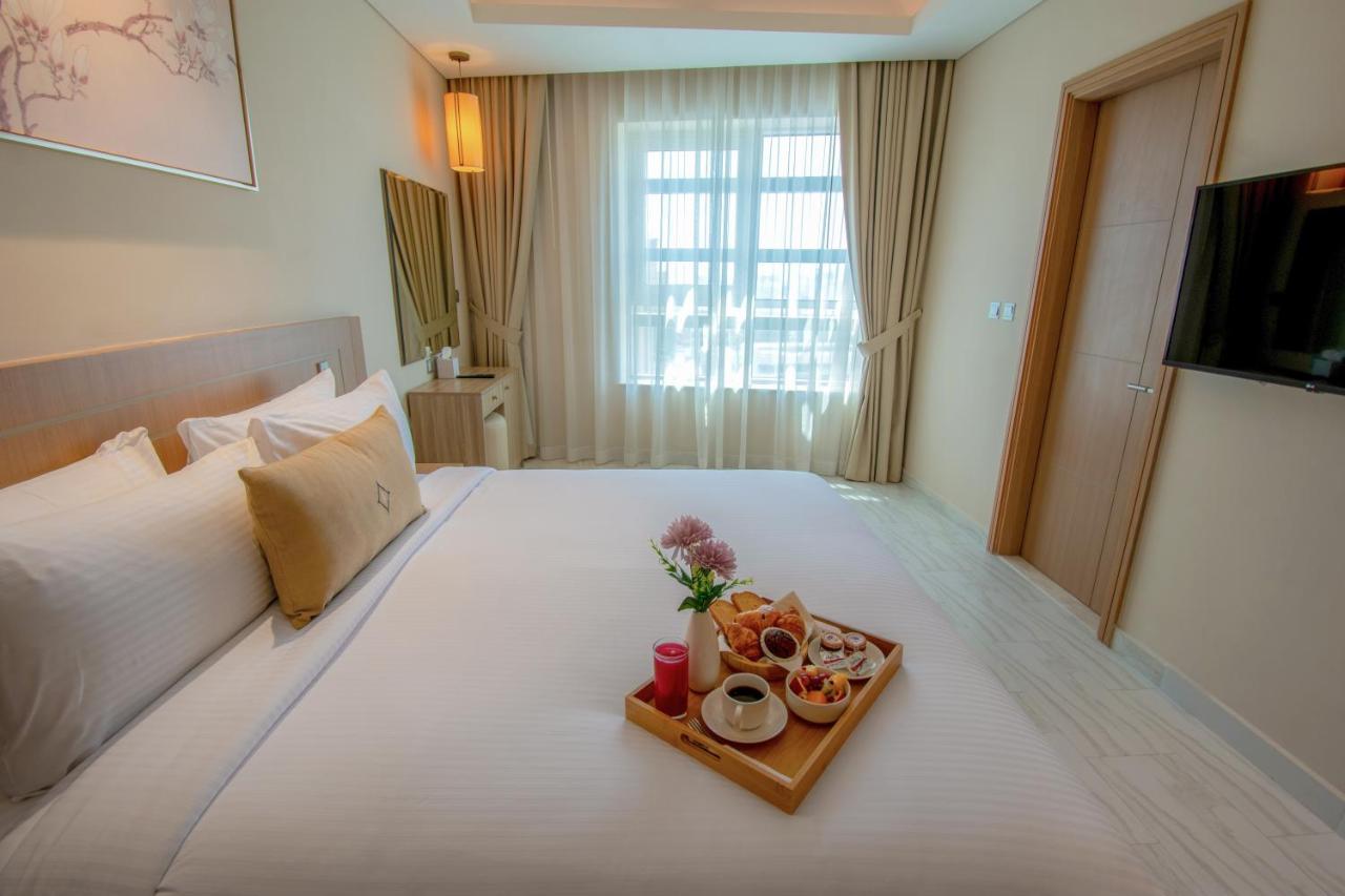 דובאי Jood Hotel Apartments מראה חיצוני תמונה