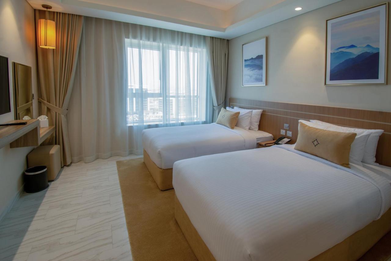 דובאי Jood Hotel Apartments מראה חיצוני תמונה