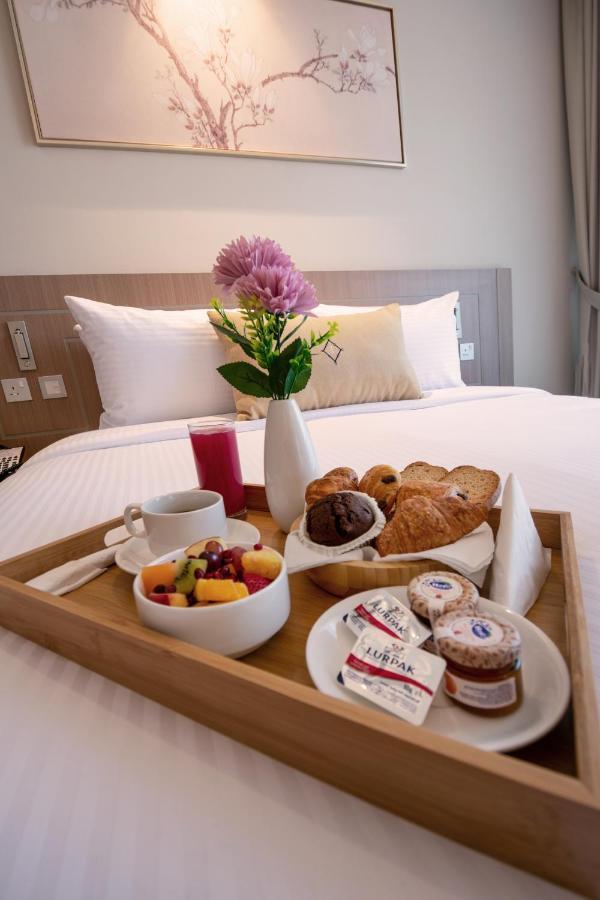 דובאי Jood Hotel Apartments מראה חיצוני תמונה