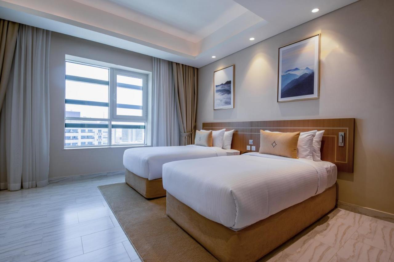 דובאי Jood Hotel Apartments מראה חיצוני תמונה