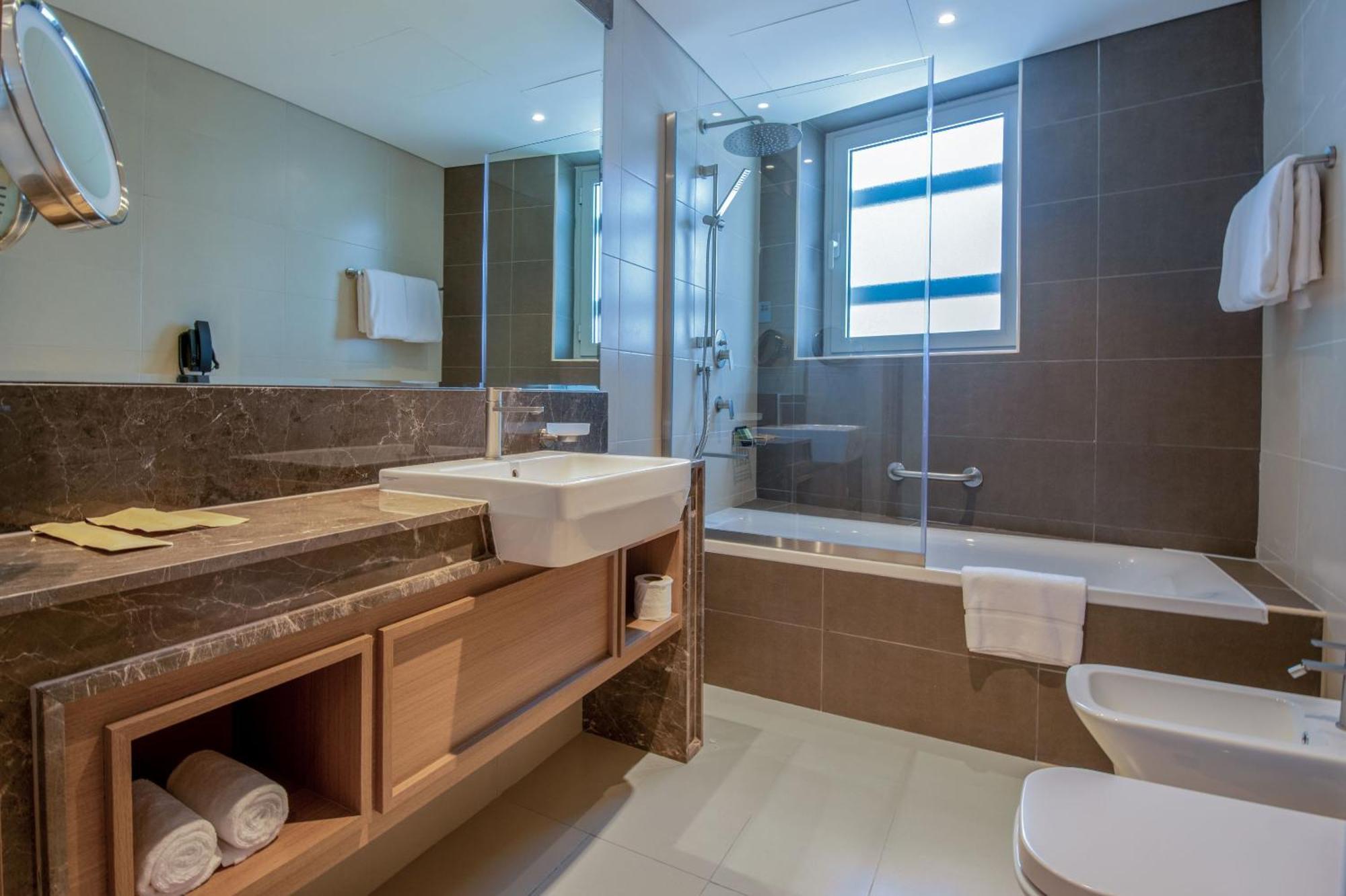 דובאי Jood Hotel Apartments מראה חיצוני תמונה