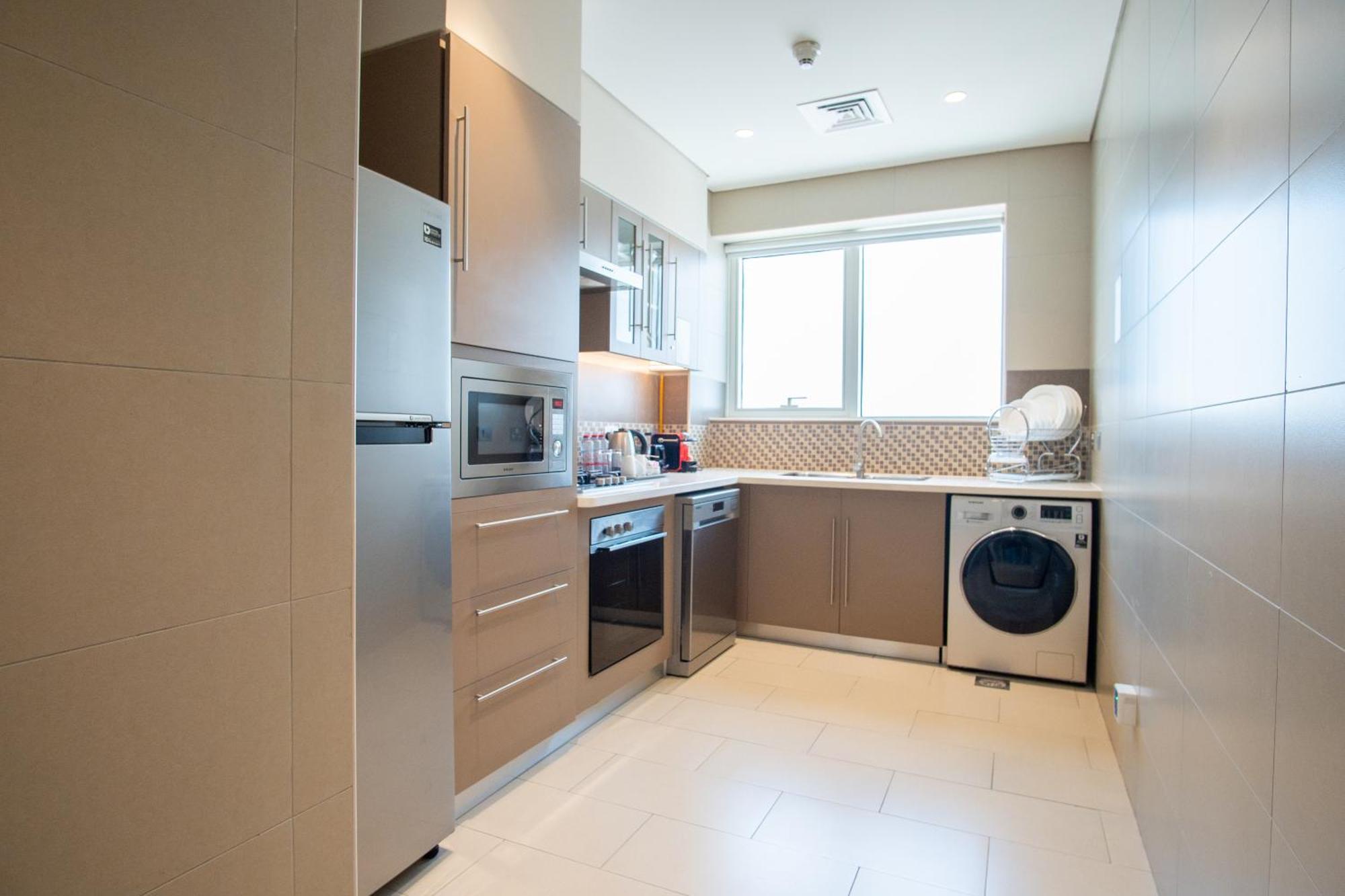 דובאי Jood Hotel Apartments מראה חיצוני תמונה